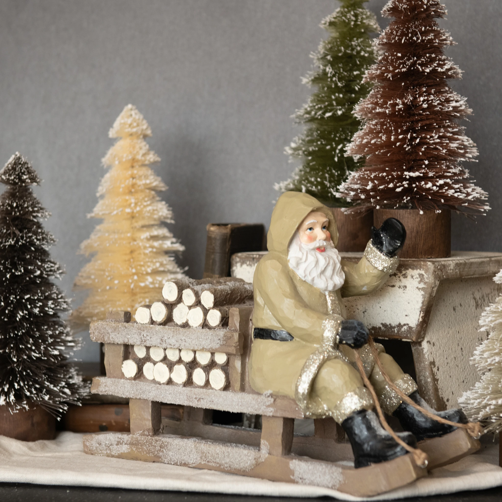 Tan Sledding Santa