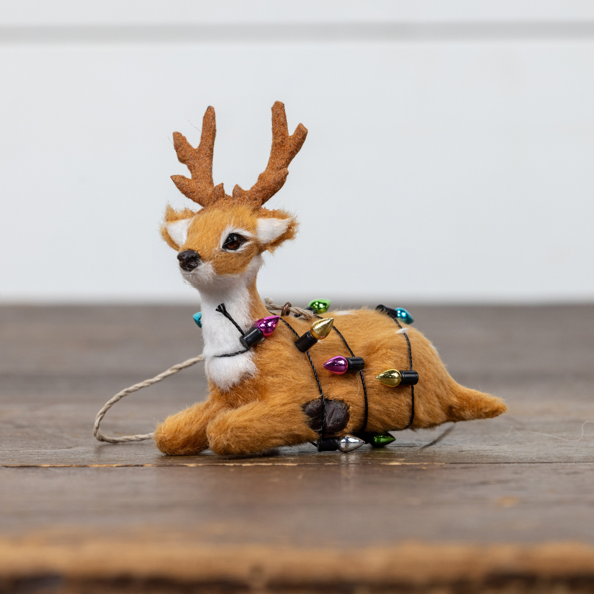 Resting Festive Fur Deer Ornament, photo 3 of 3