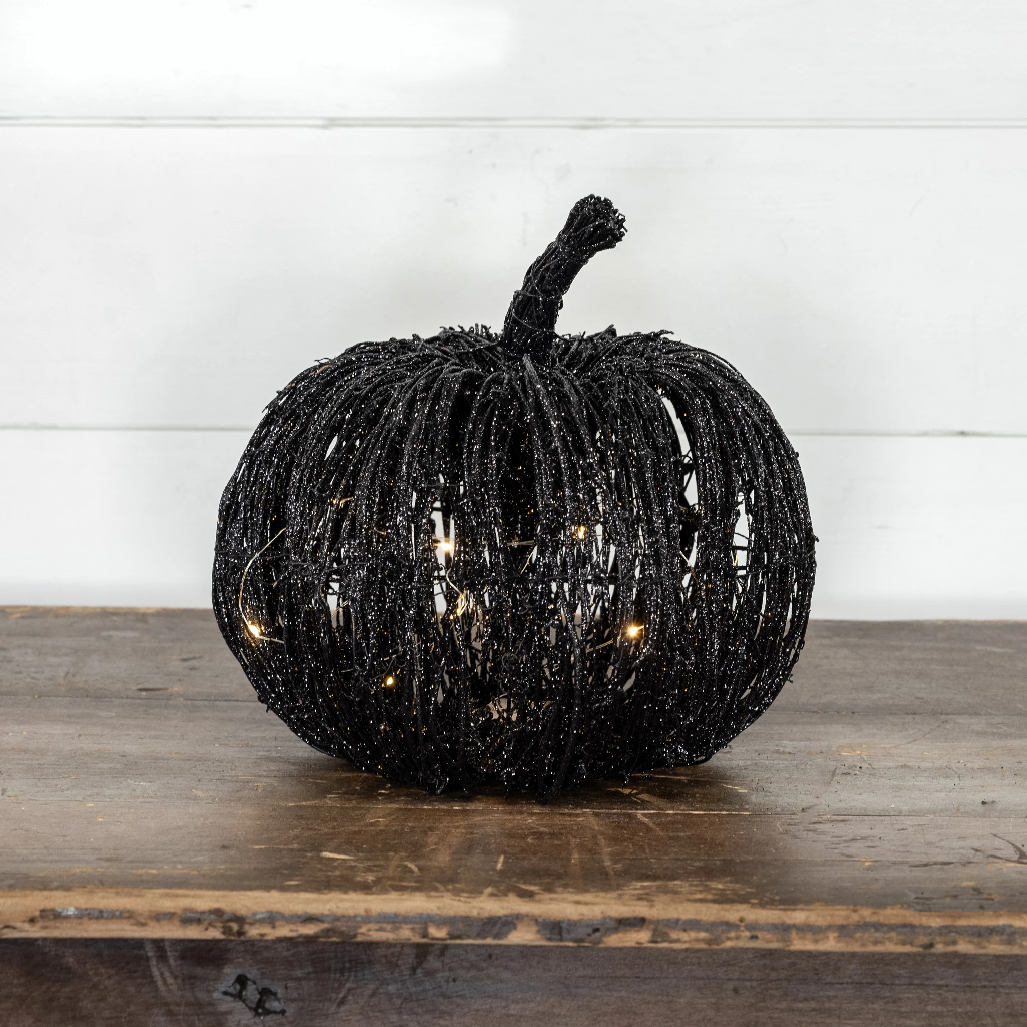 Lighted Black Glitter Rattan Pumpkin, 11" — photo 1 of 2
