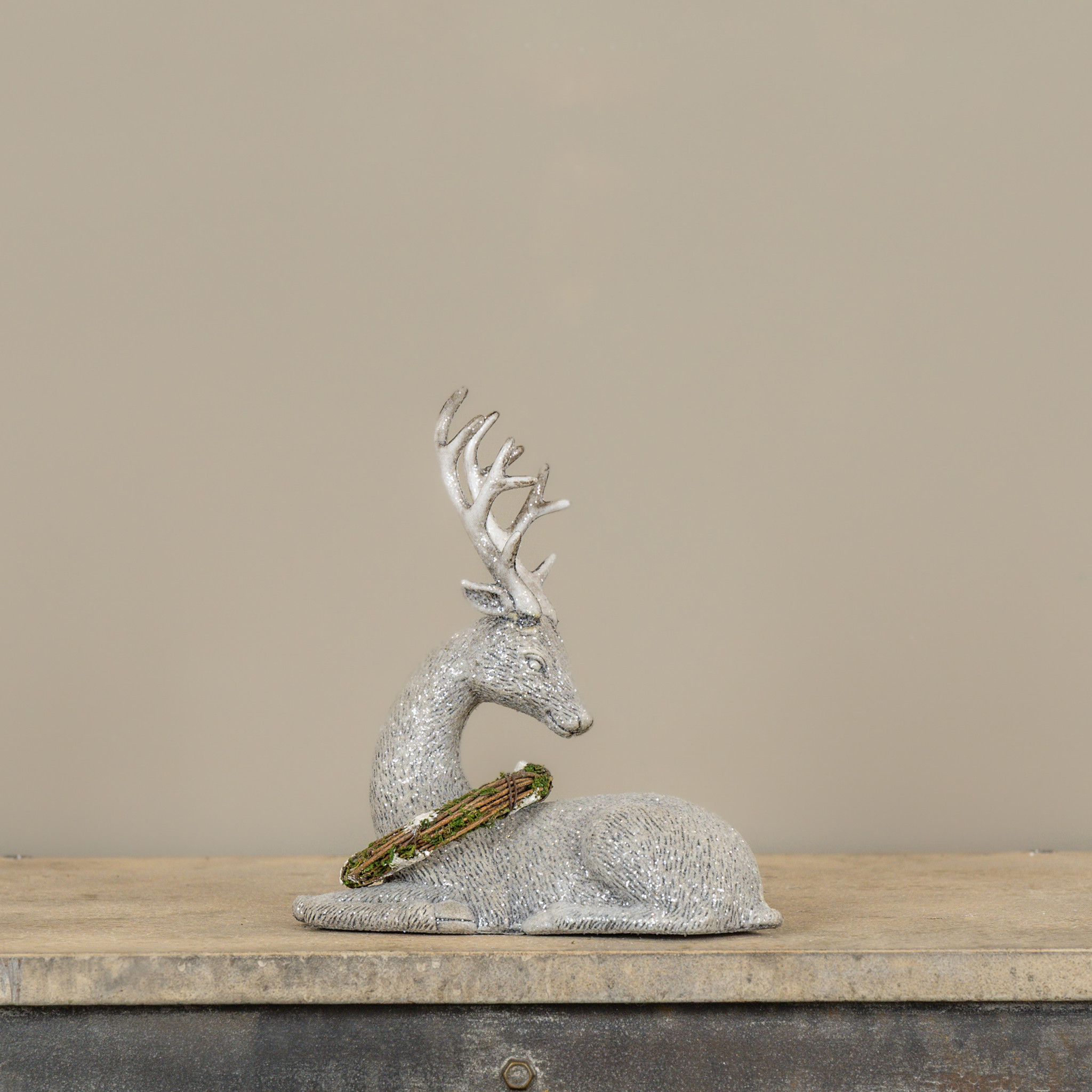 Right Facing Laying Deer with Wreath