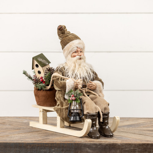SANTA ON SLED W/ OLIVE GREEN COAT