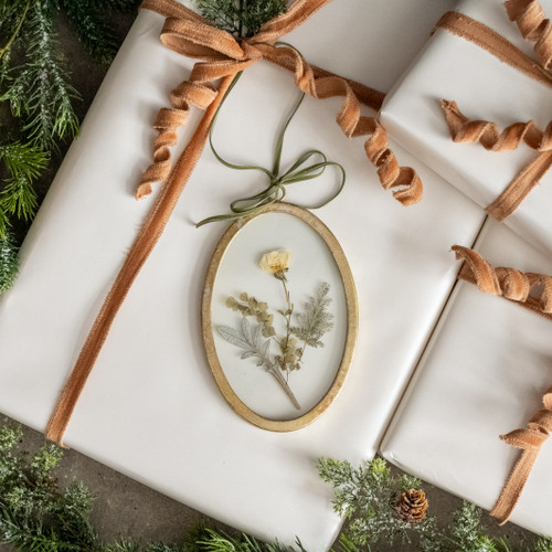 OVAL PRESSED FLORAL ORNAMENT