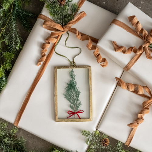 RECTANGLE PRESSED HOLIDAY FLORAL W/ RED BOW ORNAMENT