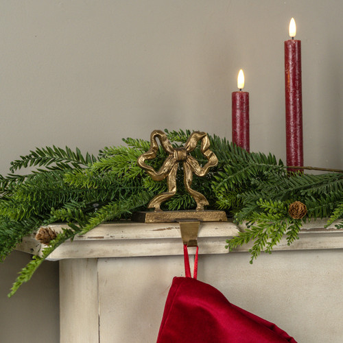 GOLD BOW STOCKING HOLDER