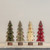 SET/4 12" CLASSIC SNOWY BOTTLEBRUSH TREES W/ ORNAMENTS
