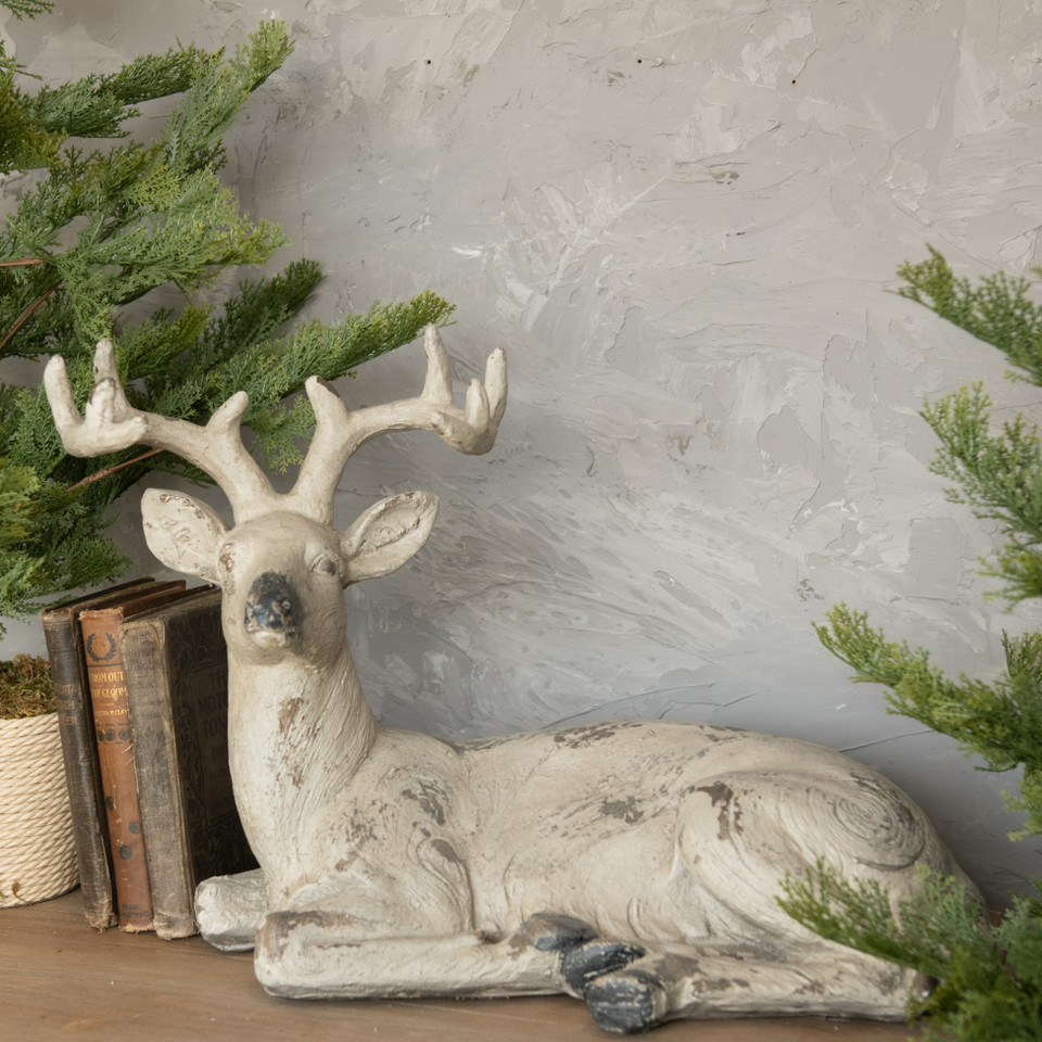 SITTING DEER STATUETTE