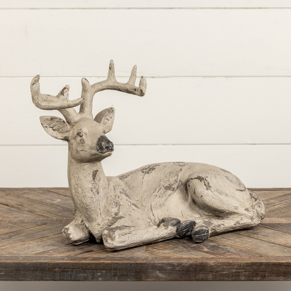 SITTING DEER STATUETTE
