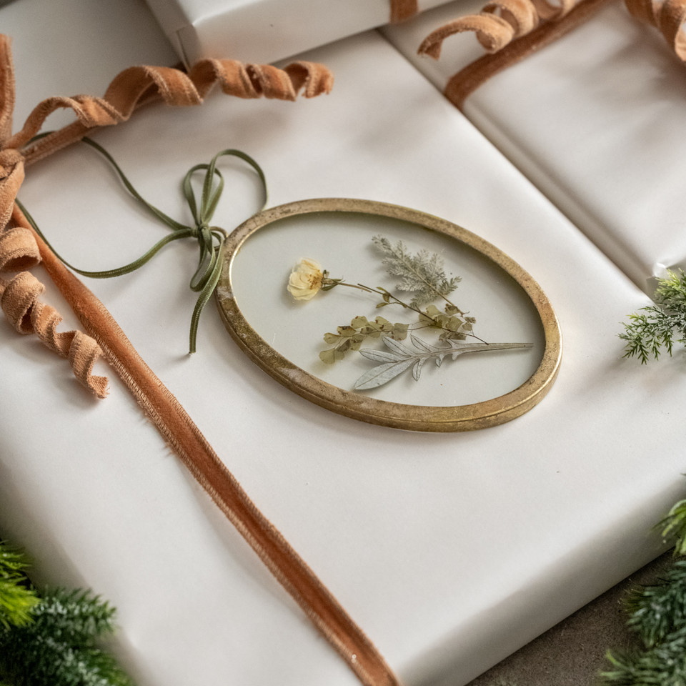 OVAL PRESSED FLORAL ORNAMENT