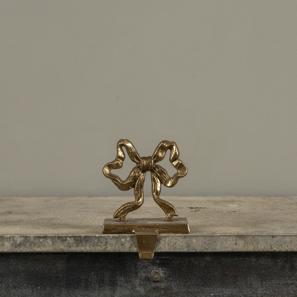 GOLD BOW STOCKING HOLDER