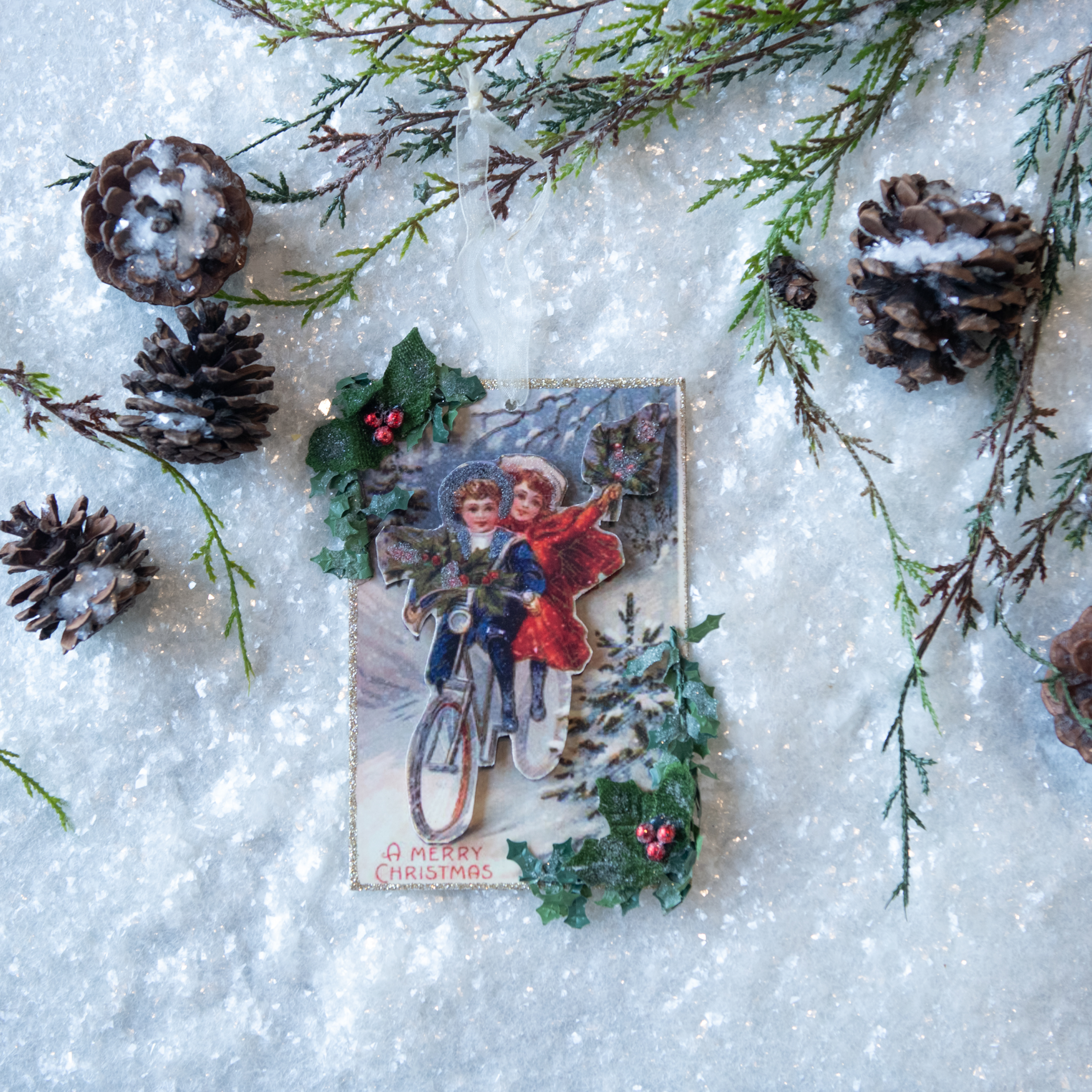 A MERRY CHRISTMAS POSTCARD ORNAMENT