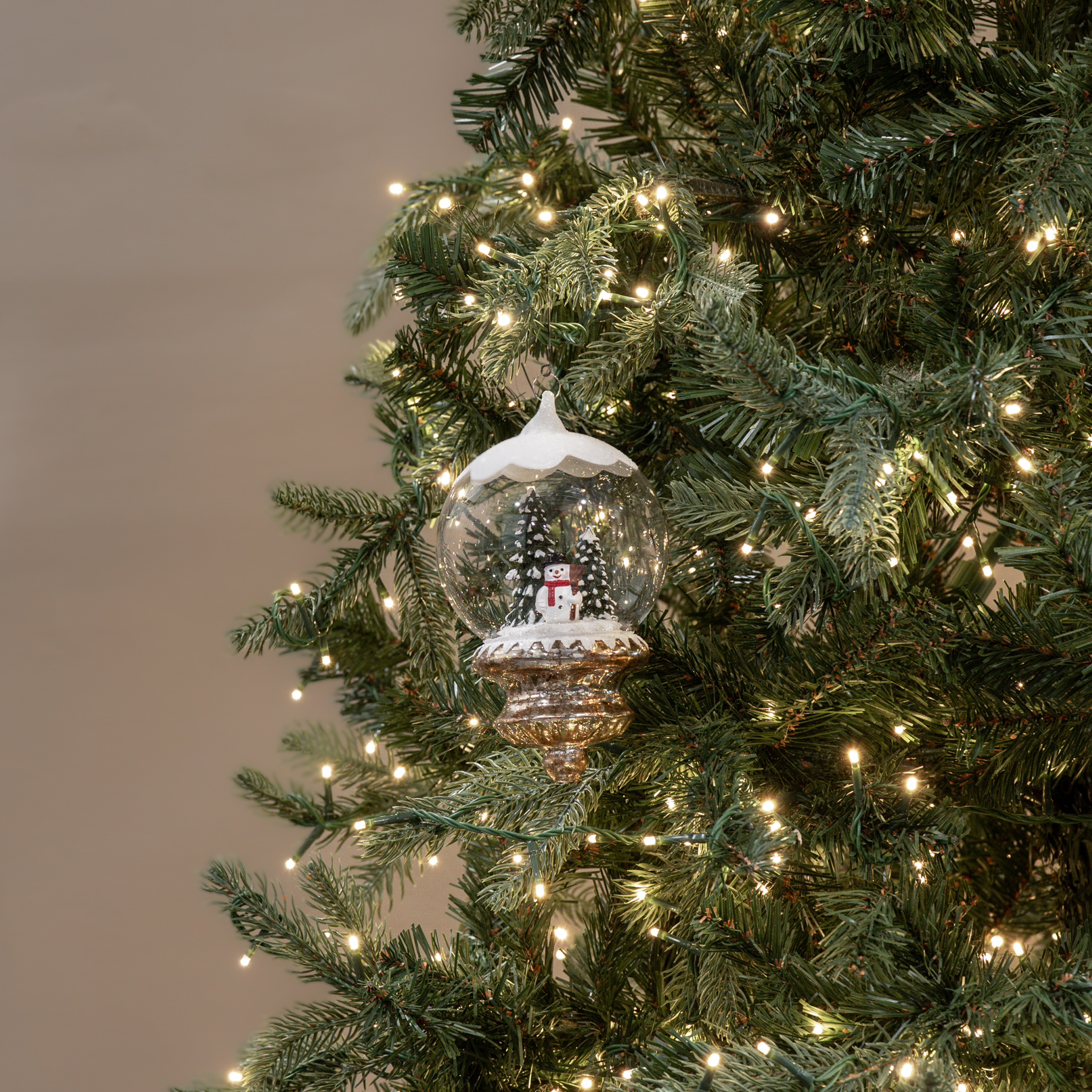 SNOW TOPPED GLOBE W/ SNOWMAN ORNAMENT
