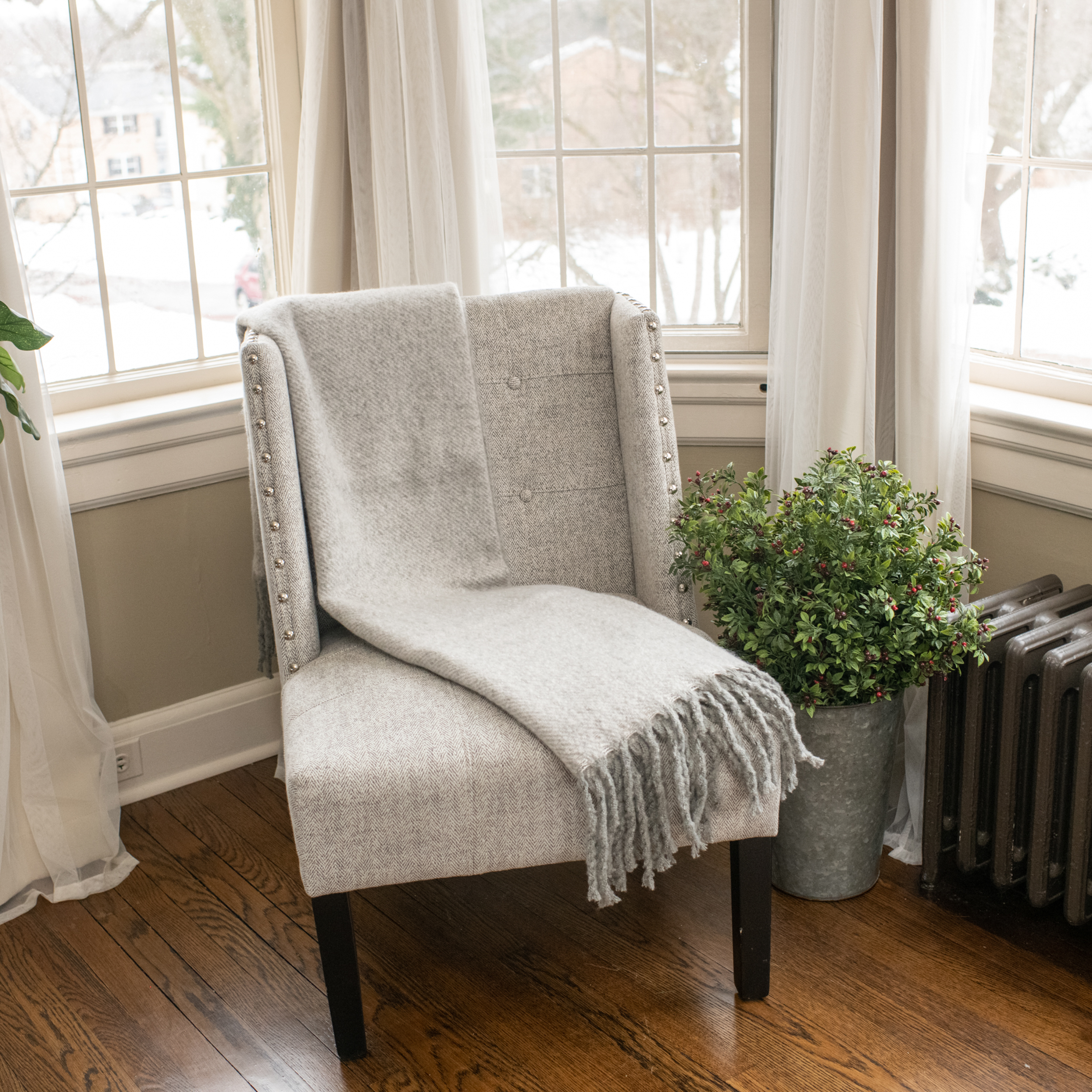 GREY TASSEL THROW