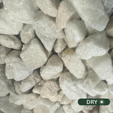 Close up photograph of Spanish White. When dry, stones are a shimmering, clean brilliant white that stays bright in the sun.