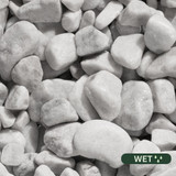 Close up photograph of White Pebbles. When wet, stones have a glossy, brilliant white finish with a polished, reflective surface.