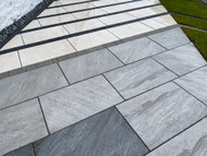 ​Paving Perfection: Comparing the Benefits and Features of Porcelain, Natural Sandstone, and Concrete Paving