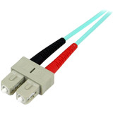 StarTech.com 10m Fiber Optic Cable - 10 Gb Aqua - Multimode Duplex 50/125 - LSZH - LC/SC - OM3 - LC to SC Fiber Patch Cable - LC Male (A50FBLCSC10)