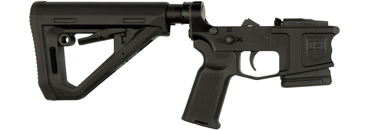 Front side view of DS-15 Typhoon assembled fixed-magazine lower receiver in black with factory-installed 10-round PMAG, and black Magpul DT stock & K2 grip