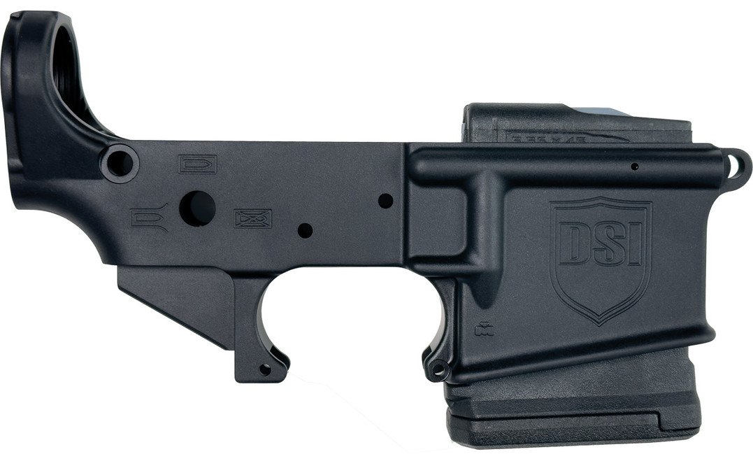 Side view of DS-15 forged fixed magazine stripped lower receiver with open trigger guard, integrated Magpul PMAG Gen M3 10-round fixed magazine, forged 7075-T6 aluminum, black anodized finish