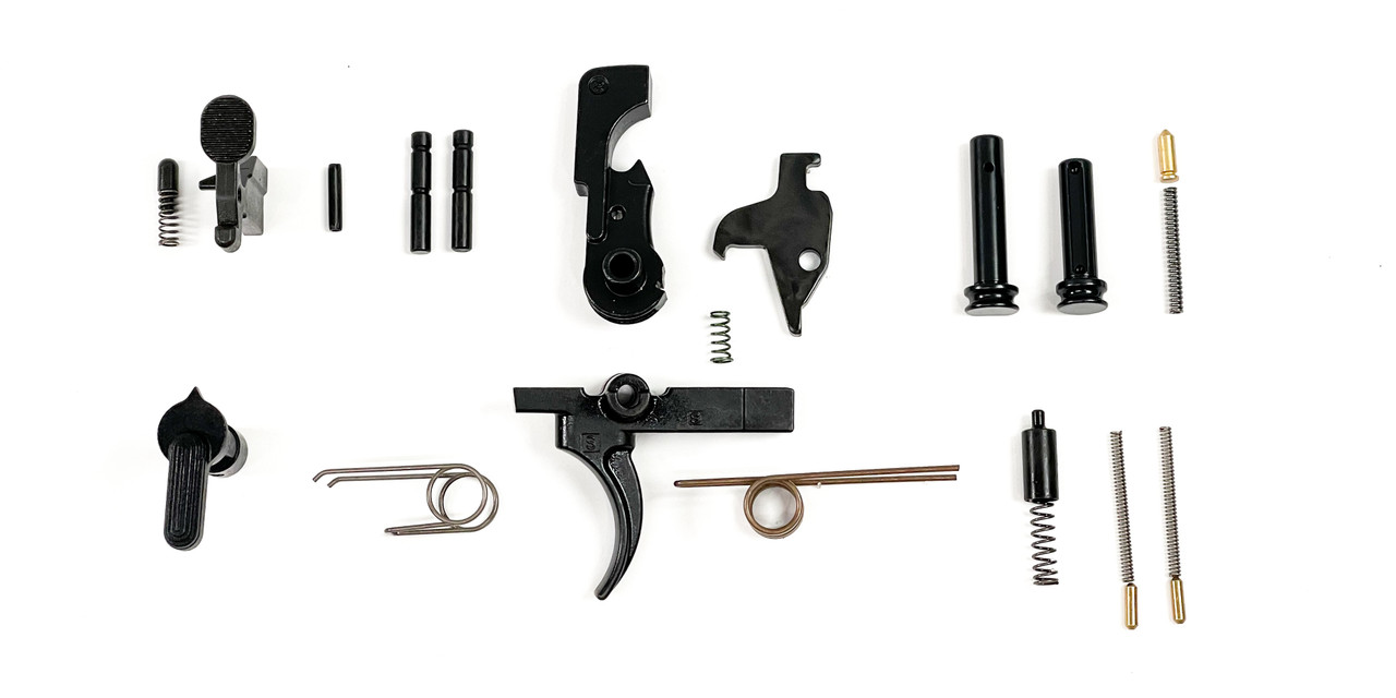 Top-down view of DSI 9mm lower parts kit for AR-9 rifles including black trigger, hammer, disconnectors, springs, bolt catch, safety selector, and pins