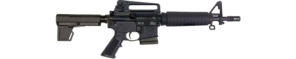 Side view of Dark Storm DS-15 M4S fixed-magazine pistol with forged 7075 receiver, 7″ CAR15 forearm, 10.5″ 5.56 barrel, A2 sights, and carry handle