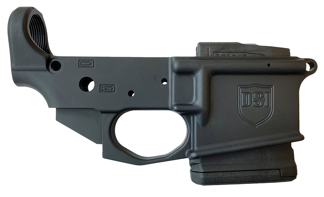Side view of DS-15 forged fixed magazine stripped lower receiver with closed winter trigger guard, integrated Magpul PMAG Gen M3 10-round fixed magazine, forged 7075-T6