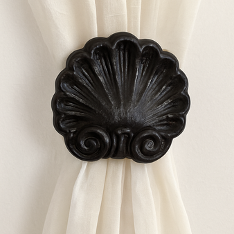 Traditional medium drapery medallion that can lend to the seashell side of your decor – 3-3/4″ diameter with a 3″ – 5″ diameter.