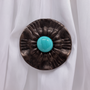 Contemporary and unique drapery medallion embellished with a cyan opaque glass stone – 2-1/2″ diameter with a 3″ – 5″ projection