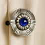 Drapery Medallion and Hardware Embellished with a blue Glass Stone