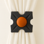 Unique drapery medallion embellished with an opaque tangerine glass stone, 1-3/4″ square with a 3″ – 5″ projection.