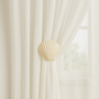 Irish Coastal Scallop™ Drapery Medallion | Authentic Seashell Curtain Holdback | Beach House Window Hardware ranging in size from 4" - 5" diameter, includes a wall mount bracket with a 3" - 5" projection from the wall.