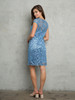 Short lace mother of the bride gown in dusty blue.