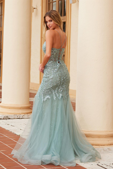 Nox Anabel R1717 sequined tulle prom or evening gown with V neck and spaghetti straps. Thigh high slit accents the front while lacing and a brush train add drama to the back. Junior sizes 00 to 16, in dusty sage or lilac.