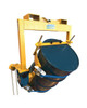A yellow crane slung drum rotator with a loop chain carrying a drum on a white background