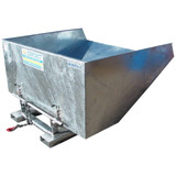 A galvanised metal tipping skip sitting on a white background. 