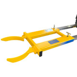 A single drum grab in yellow for carrying drums with a forklift.