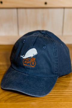 TWGS Embroidered Whale-on-the-bike Logo Baseball Hat - Distressed Navy w/ Orange