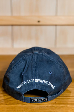 TWGS Embroidered Whale-on-the-bike Logo Baseball Hat - Distressed Navy w/ Orange