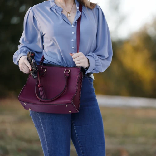 JESSIE JAMES HANDBAGS LIONESS CONCEALED CARRY SATCHEL BAG WITH TASSEL
