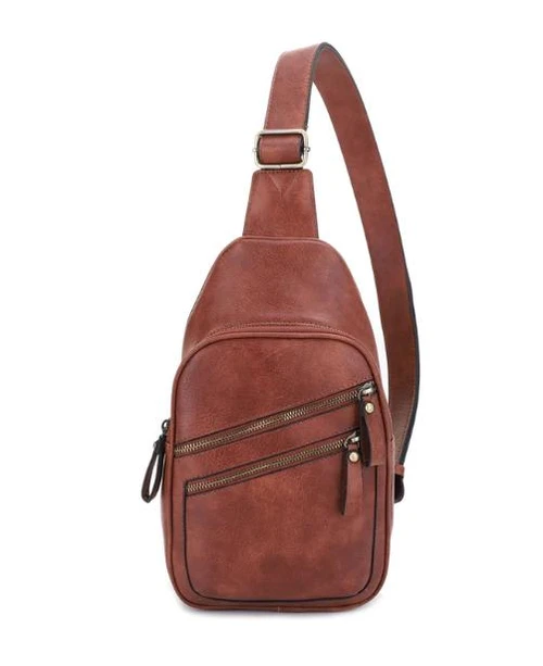 JESSIE JAMES HANDBAGS  Jeannie Concealed Carry Lock and Key Sling Shoulder Backpack