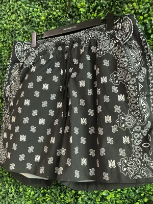 AMIRI BLACK PAISLEY SWIM TRUNKS