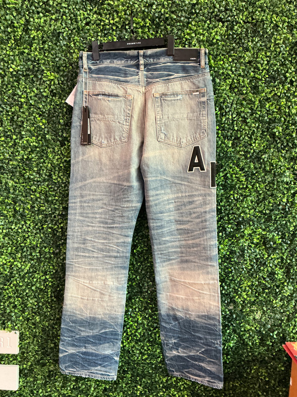 BRAND NEW AMIRI STRAIGHT LEG APPLIQUE LOGO JEANS (SZ 31)