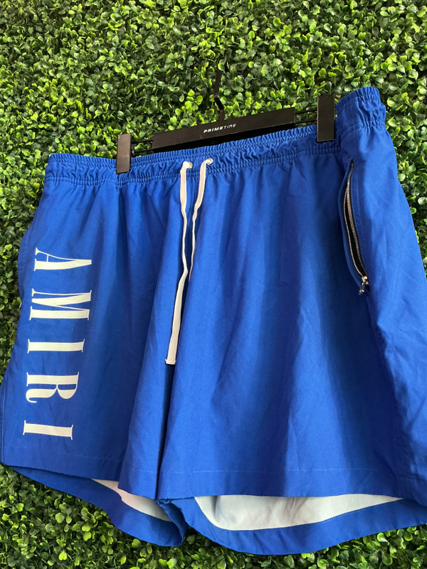 AMIRI BLUE SWIM TRUNKS (SZ 2XL)