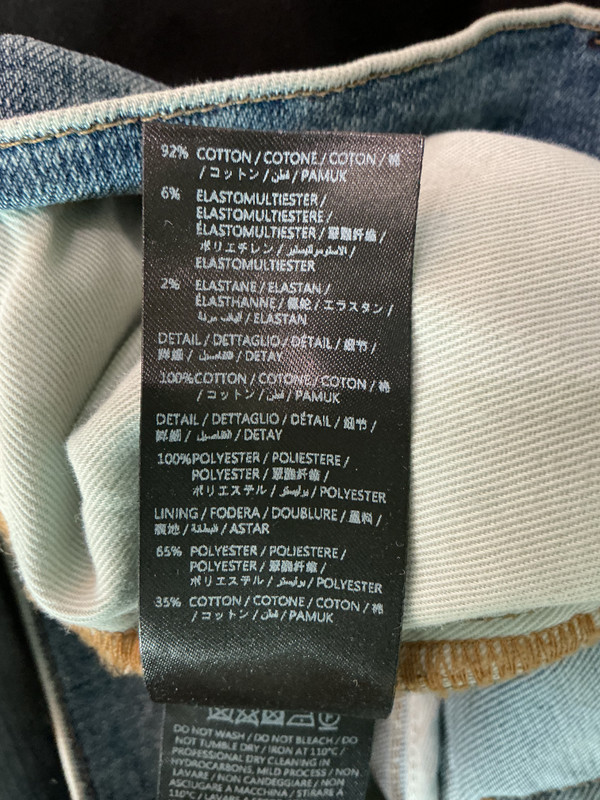 AMIRI STAGGERED LOGO DENIM JEANS (SZ 34)