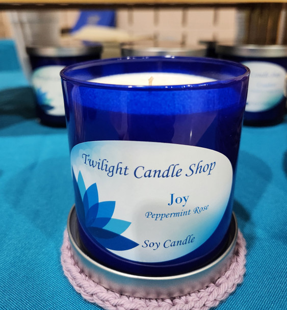 Blue soy candles with uplifting messages of Comfort, Hope, Joy, Peace