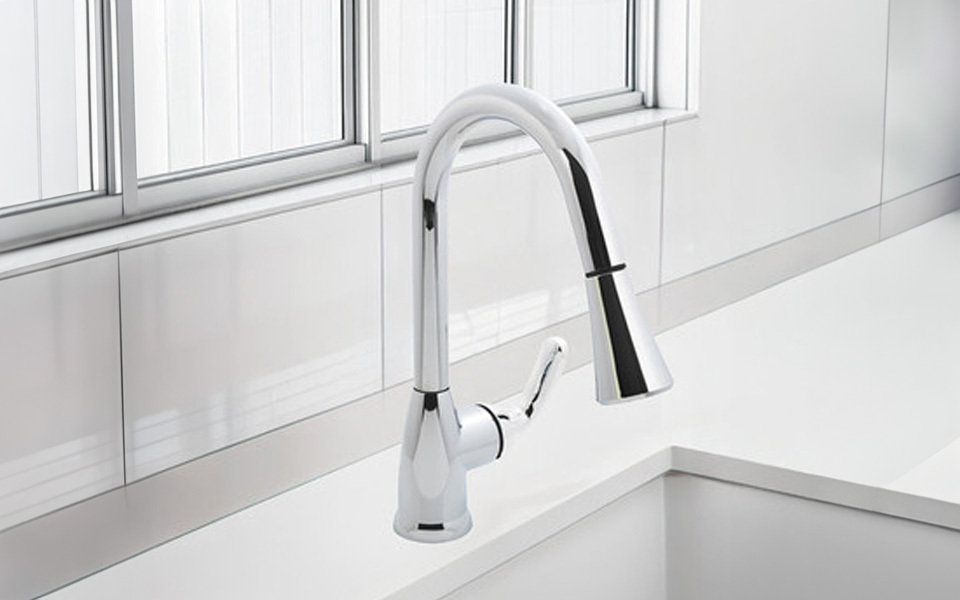 faucet in clean kitchen area