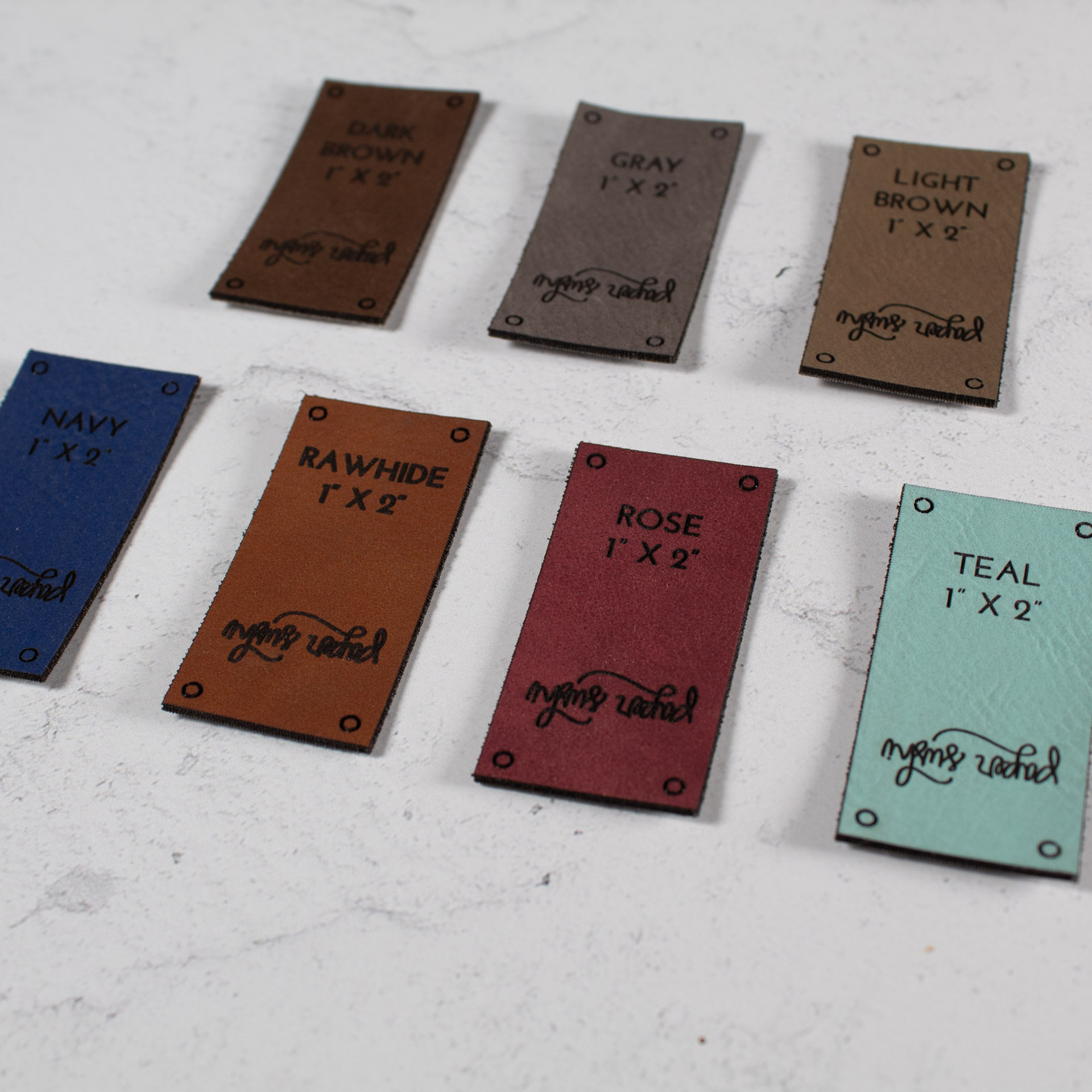 Custom Leatherette Tags for Knitwear and Apparel
