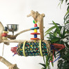 Sea grass mats rolled around various little elements that adds a lot of texture to the bird toy. This toy is great for shredding and foraging for your bird! Sea grass mats rolled around various little elements that adds a lot of texture to the bird toy. This toy is great for shredding and foraging for your bird!