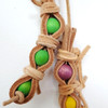 Original and classical, Pablo's Parrot Pea Pod is a simple but effective bird toy design.  Colorful beads are exposed to entice your bird to seek and chew.  Yet the bird needs to work through a thick layer of vegetable tanned leather first.  It takes time and dedication to do so.  Let's see if your bird will call you for help!  This toy will make a good foot toy for bigger birds too. Original and classical, Pablo's Parrot Pea Pod is a simple but effective bird toy design.  Colorful beads are exposed to entice your bird to seek and chew.  Yet the bird needs to work through a thick layer of vegetable tanned leather first.  It takes time and dedication to do so.  Let's see if your bird will call you for help!  This toy will make a good foot toy for bigger birds too.