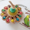 What a happy bird toy that just put a big smile on your face and if it does, of course, your bird too!  It is colorful, warm and festive.  Birds can no doubt see colors, we trust that he/she will be as happy seeing this toy as we are.  Suspend it from the above and let your bird swing around atop!  Happy Holiday! What a happy bird toy that just put a big smile on your face and if it does, of course, your bird too!  It is colorful, warm and festive.  Birds can no doubt see colors, we trust that he/she will be as happy seeing this toy as we are.  Suspend it from the above and let your bird swing around atop!  Happy Holiday!