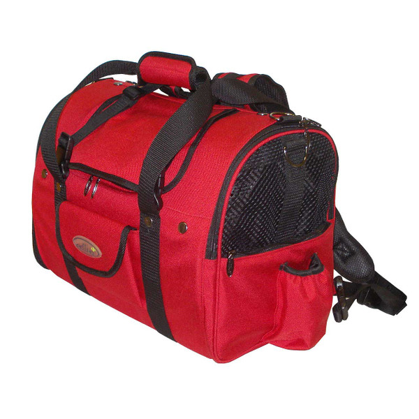 A bright red Celltei Backpack pet carrier keeps your dog in sight when you are hiking in the wood or forest. 